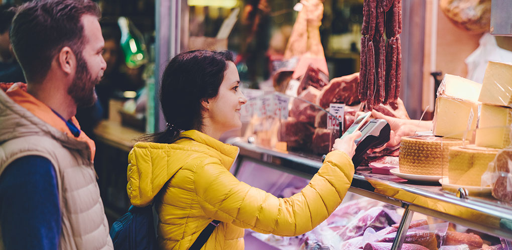 Woman paying with credit card
