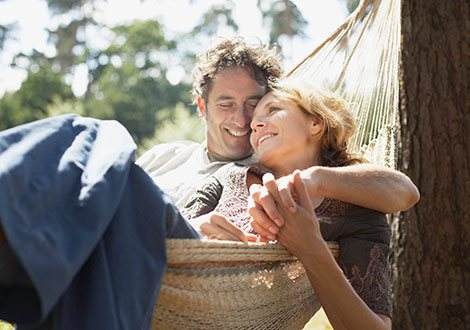 Couple laying in hammock